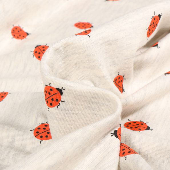 Tissu Jersey Coton Cocci sur fond Gris chiné - Par 10 cm