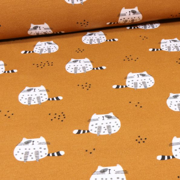 Tissu Jersey envers molletonné Caty sur fond Moutarde - Par 10 cm