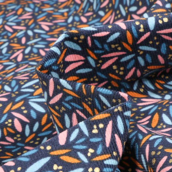 Tissu Velours milleraies Pétales Colorées sur fond Bleu marine - Par 10 cm