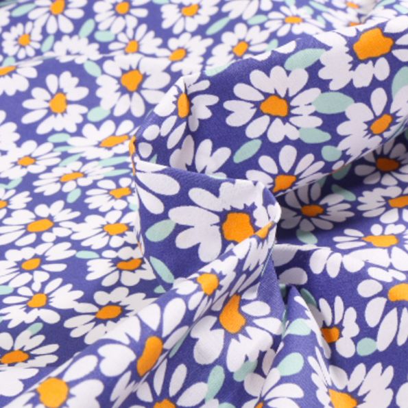 Tissu Coton enduit Alma Pâquerettes sur fond Bleu - Par 10 cm