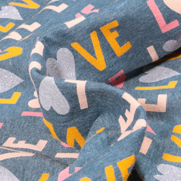 Tissu Jersey Coton LOVE sur fond Bleu chiné - Par 10 cm