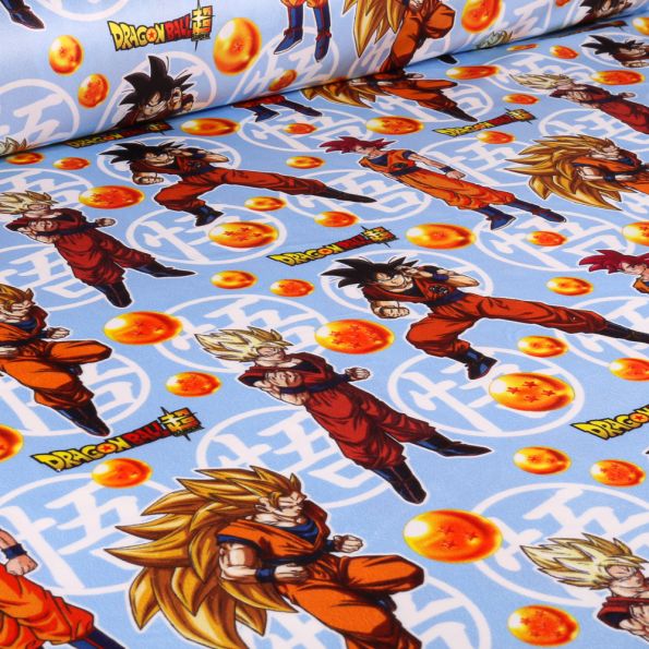 Tissus Velours d'ameublement sous licence Dragonball Z Boule de feu sur fond Bleu ciel - Par 10 cm