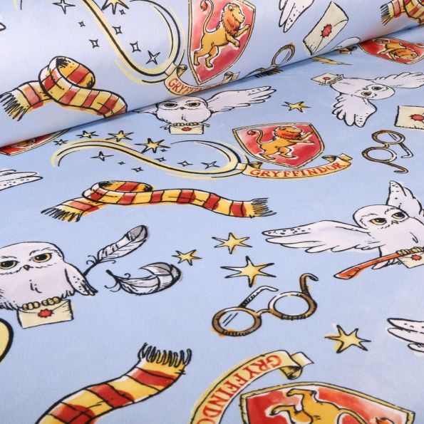 Tissus Velours d'ameublement sous licence Edwige gryffondor sur fond Bleu - Par 10 cm