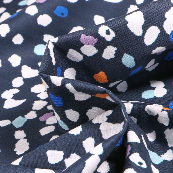 Tissu Coton imprimé Frou-Frou Pollen sur fond Bleu marine - Par 10 cm