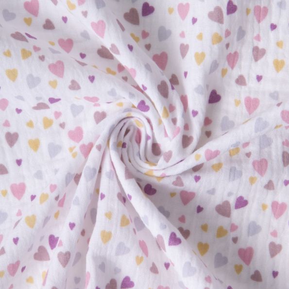 Tissu Double gaze de Coton Cotillons coeurs sur fond Blanc - Par 10 cm