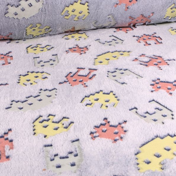 Tissu Doudou Monstres pixel sur fond Gris - Par 10 cm