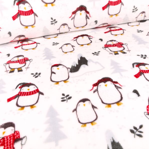 Tissu Doudou Manchots au ski sur fond Blanc - Par 10 cm