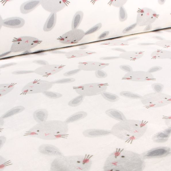 Tissu Doudou Lapinou sur fond Blanc - Par 10 cm