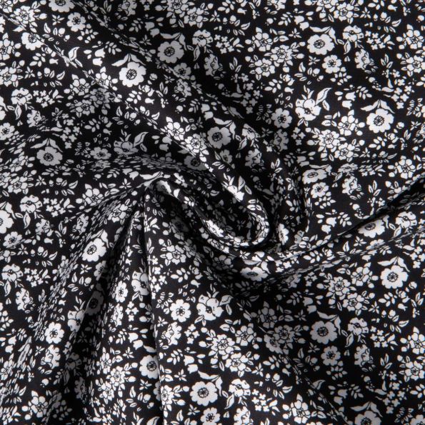 Tissu Coton imprimé Lutos Pia sur fond Noir - Par 10 cm