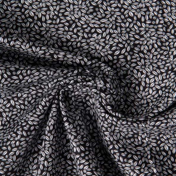 Tissu Coton imprimé Lutos Lio sur fond Noir - Par 10 cm