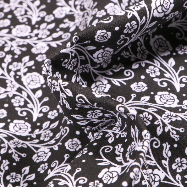 Tissu Coton MC Fabrics Arabesques de roses sur fond Noir - Par 10 cm