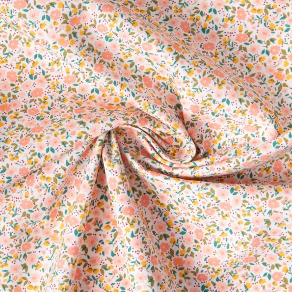 Tissu Coton imprimé Liberté floral  rose saumon sur fond Blanc - Par 10 cm