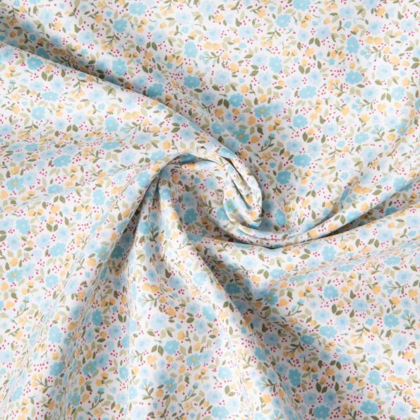Tissu Coton imprimé Liberté floral jaune bleu sur fond Blanc - Par 10 cm