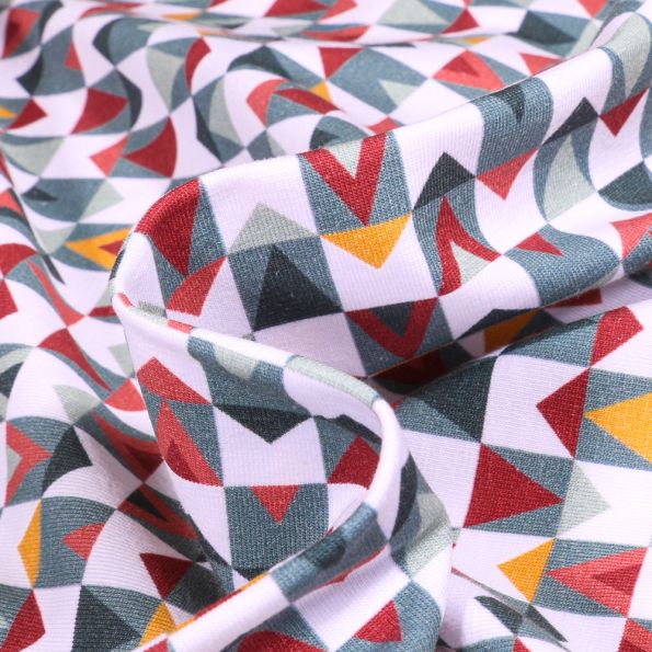 Tissus Jersey Coton Tricarrés sur fond Blanc - Par 10 cm