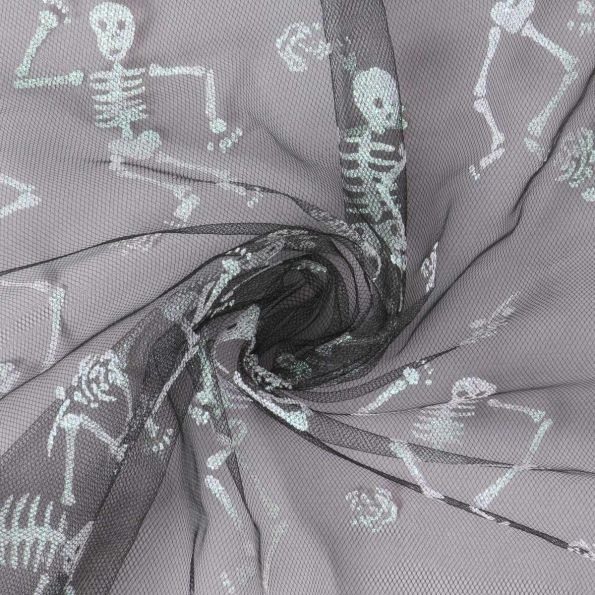 Tissu Tulle souple  Morgana squelettes paillettes argentés et irisés sur fond Noir - Par 10 cm