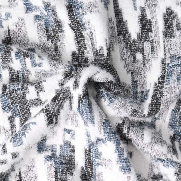 Tissu Maille ethnique duveteux Bleu sur fond Blanc - Par 10 cm