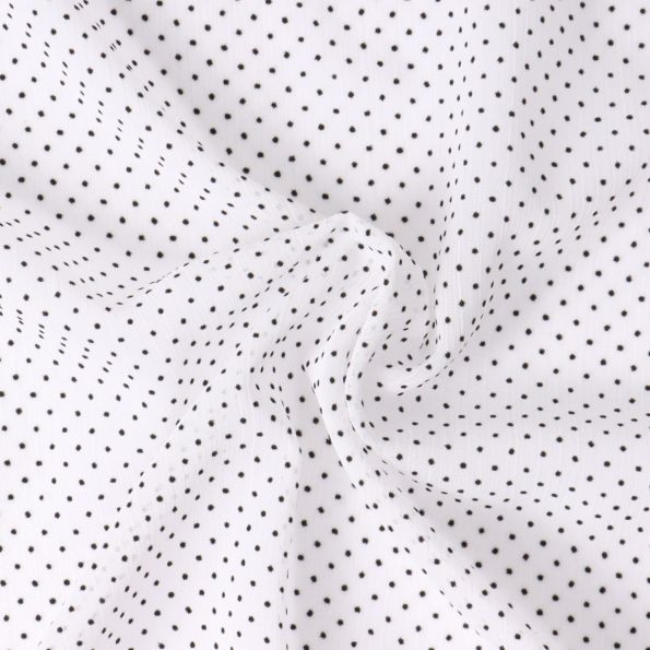 Tissu Mousseline  texturé Mini pois sur fond Blanc - Par 10 cm