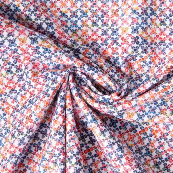 Tissu Coton imprimé Moucharabieh Multicolore sur fond Blanc - Par 10 cm