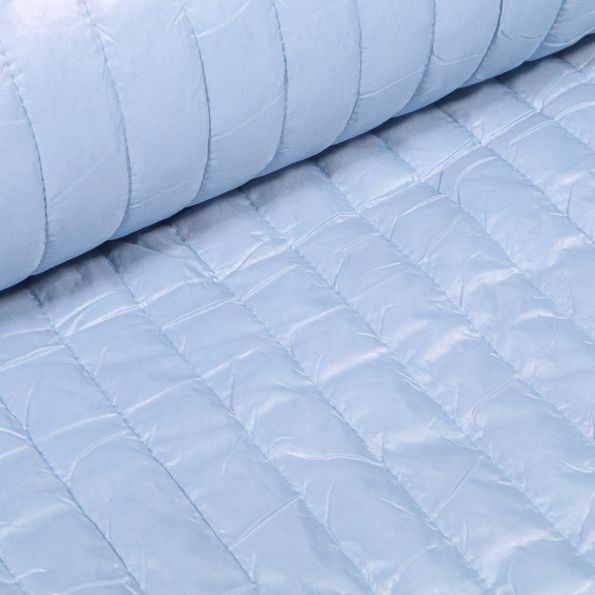 Tissu Doudoune matelassé rayé Bleu ciel - Par 10 cm