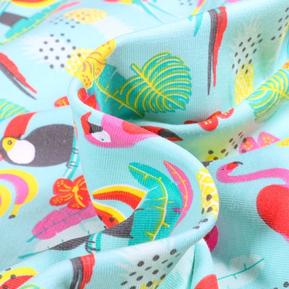 Tissu Jersey Coton Animaux des tropiques sur fond Bleu turquoise - Par 10 cm
