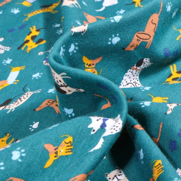 Tissu Jersey Coton Promenade chiens sur fond Bleu pétrole - Par 10 cm