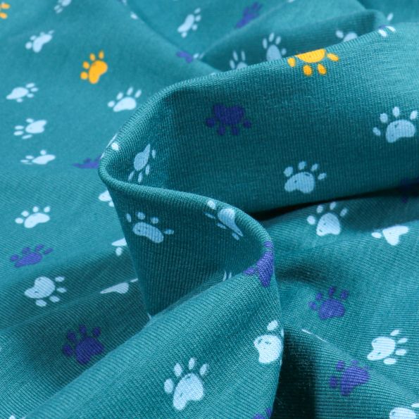 Tissu Jersey Coton Pattes de chiens sur fond Bleu canard - Par 10 cm