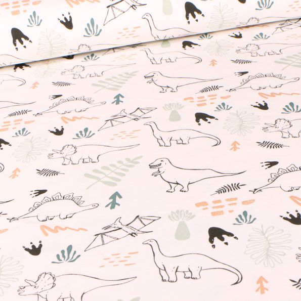 Tissu Jersey Coton Dinosaures et feuillages sur fond Ecru - Par 10 cm
