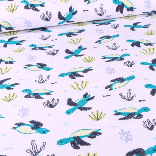 Tissu Jersey Coton Tortues et coraux bleu sur fond Blanc - Par 10 cm