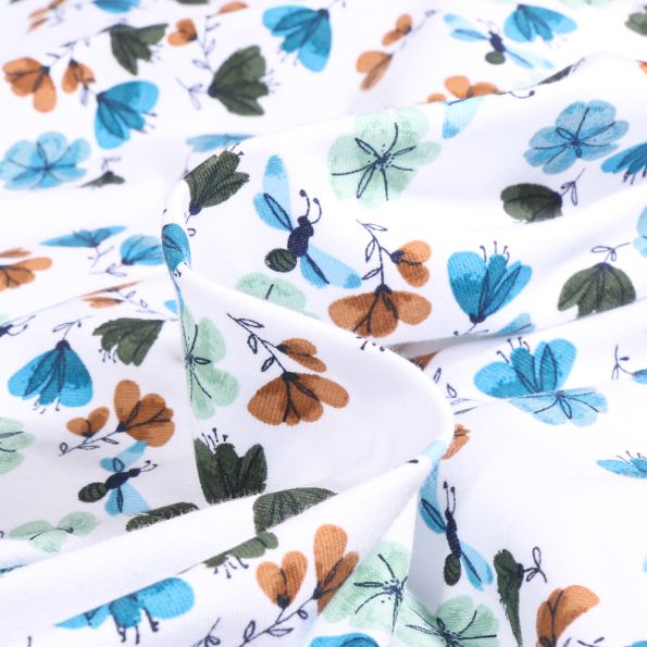 Tissu Jersey Coton Aquazur fleurs et papillons sur fond Blanc - Par 10 cm