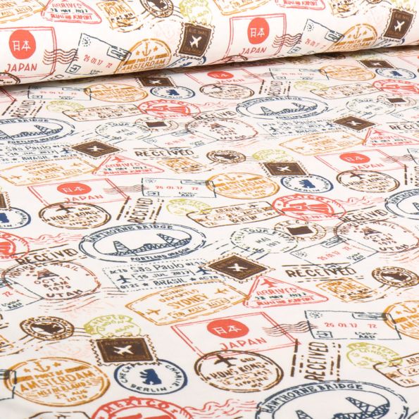 Tissu Jersey Coton Tampons Voyages rouge sur fond Ecru - Par 10 cm