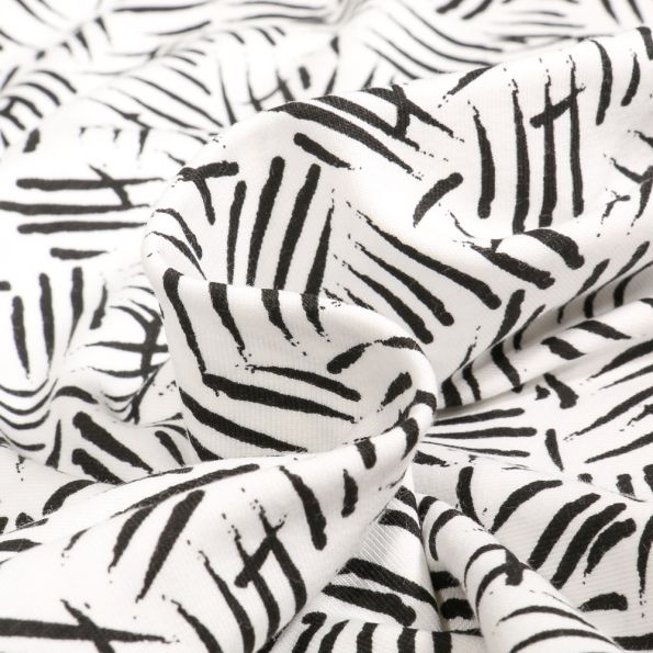 Tissu Jersey Coton Joyce sur fond Blanc - Par 10 cm