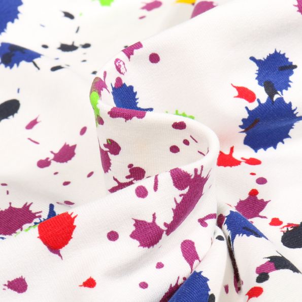 Tissu Jersey Coton Splash color violet sur fond Blanc cassé - Par 10 cm