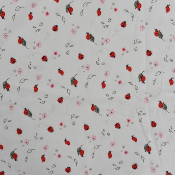 Tissu Jersey Coton Coccinelles rouges sur fond Blanc - Par 10 cm