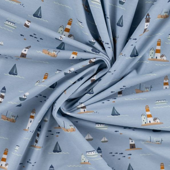 Tissu Jersey Coton imprimé Eliott phares et bateaux sur fond Bleu ciel - Par 10 cm