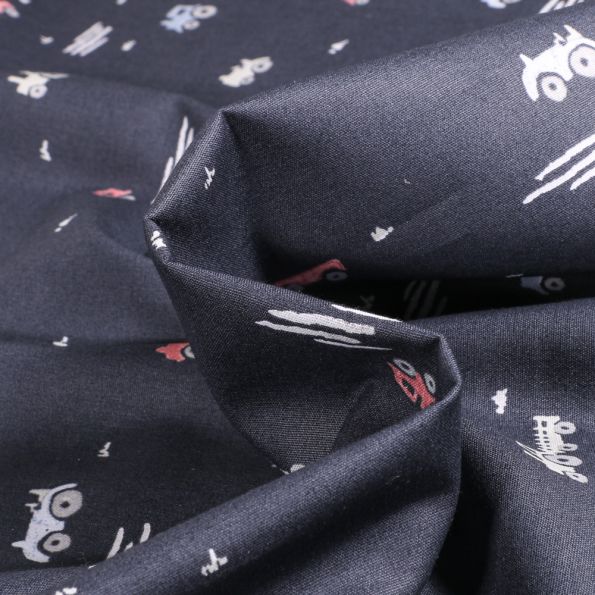 Tissu Coton imprimé Petits tracteurs sur fond Bleu marine - Par 10 cm