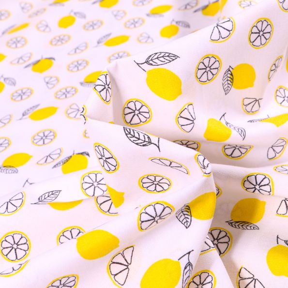 Tissu Coton imprimé Citron tranche sur fond Blanc - Par 10 cm