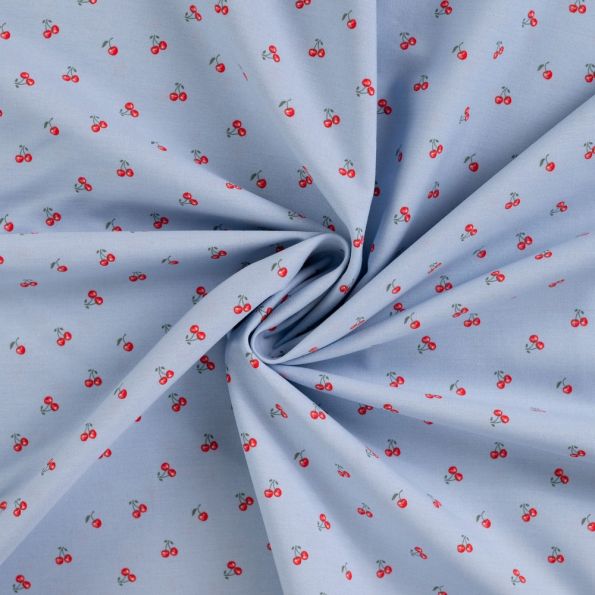 Tissu Coton imprimé Cerises rouges sur fond Bleu - Par 10 cm