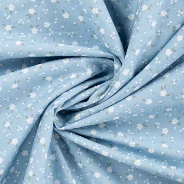 Tissu Popeline de Coton Charlotte petites fleurs sur fond Bleu ciel - Par 10 cm