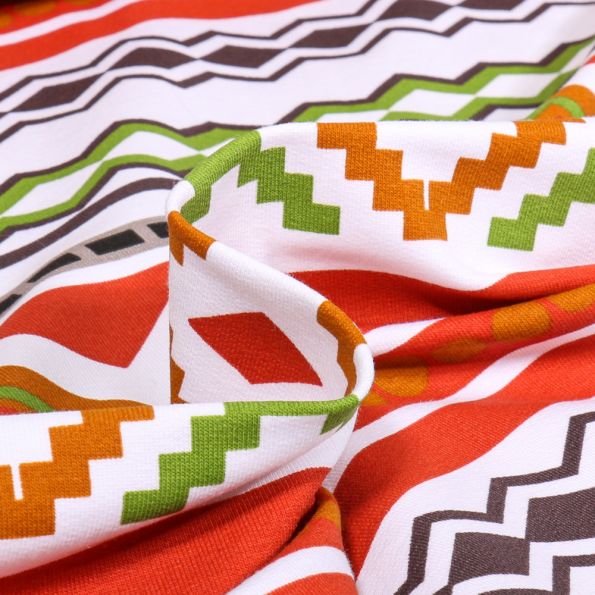 Tissu Jersey coton  Chevrons aztèques sur fond Blanc - Par 10 cm