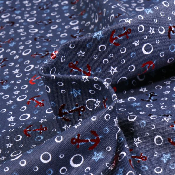 Tissu Jersey Coton Etoiles et ancres marine métalisées sur fond Bleu marine - Par 10 cm
