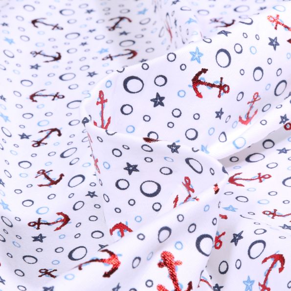 Tissu Jersey Coton Etoiles et ancres marine métalisées sur fond Blanc - Par 10 cm