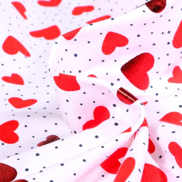 Tissu Jersey Coton Coeurs métalissés rouge sur fond Blanc - Par 10 cm