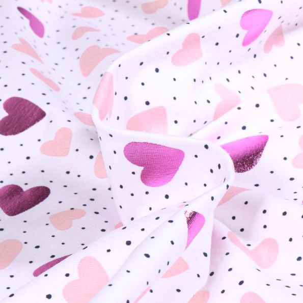 Tissu Jersey Coton Coeurs métalissés rose sur fond Blanc - Par 10 cm
