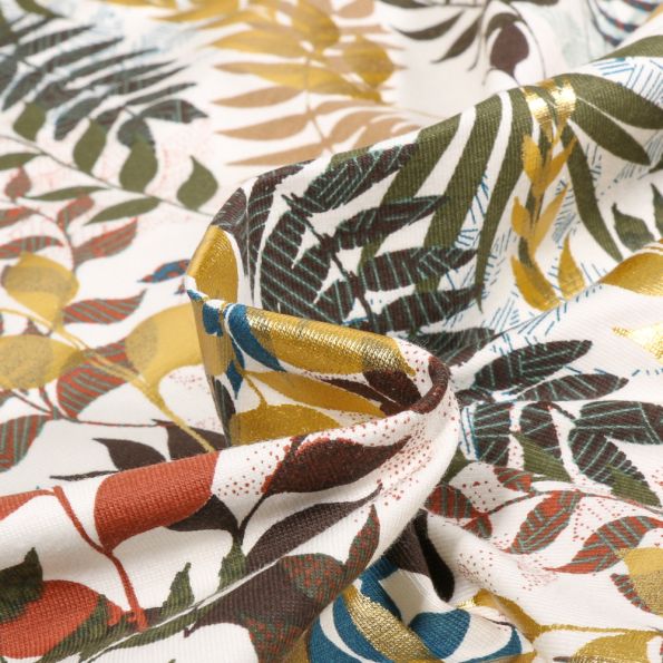 Tissu Jersey Coton Feuilles dorés sur fond Blanc - Par 10 cm