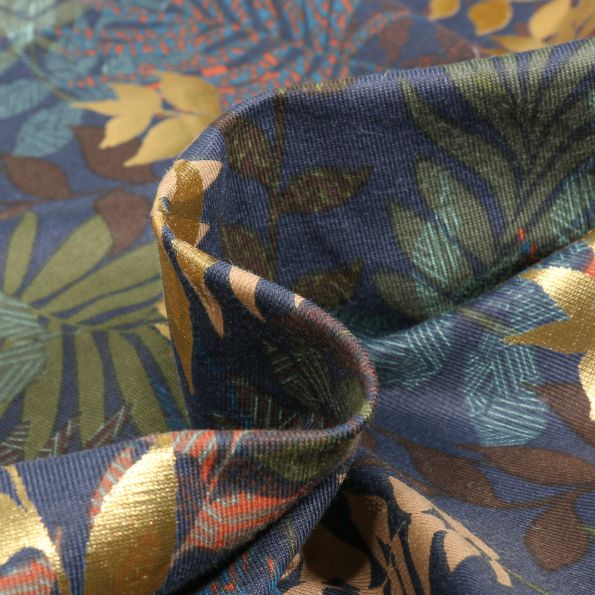 Tissu Jersey Coton Feuilles dorés sur fond Bleu - Par 10 cm