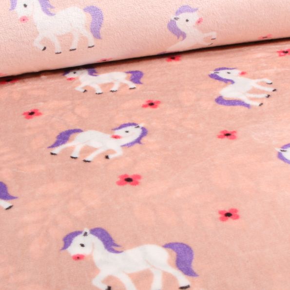 Tissu Doudou double face Pony sur fond Rose pâle - Par 10 cm