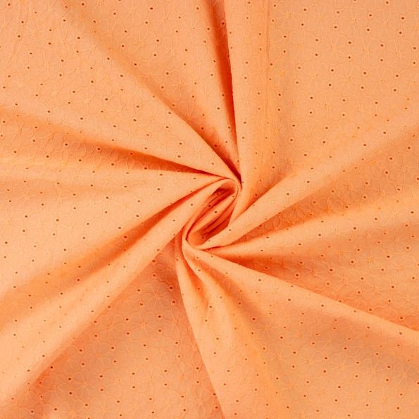 Tissu Coton brodé ajouré Fleuris sur fond Orange - Par 10 cm