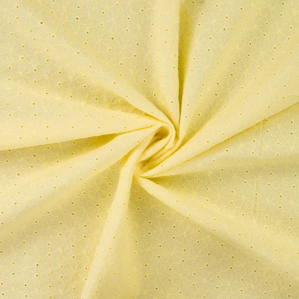 Tissu Coton brodé ajouré Fleuris sur fond Jaune - Par 10 cm