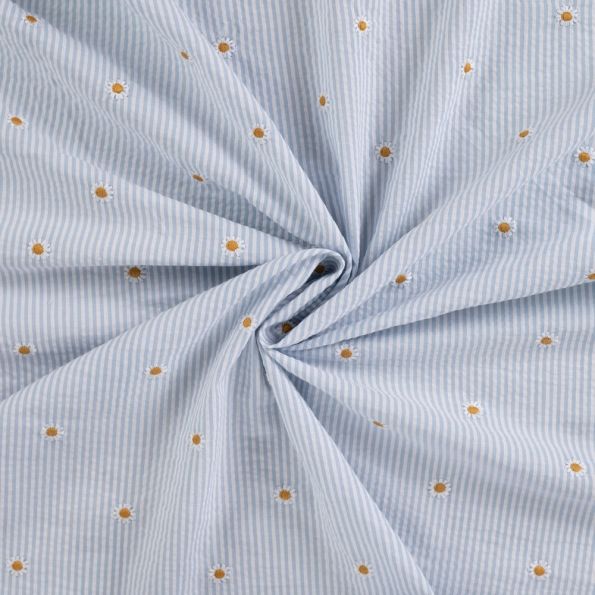 Tissu Seersucker brodé Rayures et Paquerettes sur fond Bleu ciel - Par 10 cm