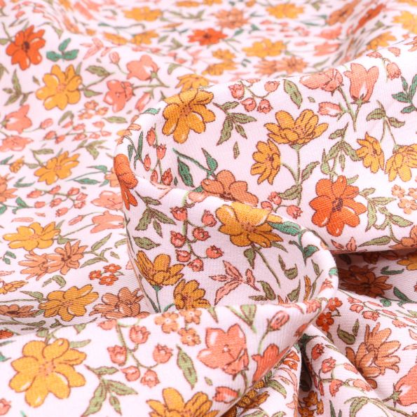 Tissu Jersey Coton Sweet Flower Florentine orange sur fond Blanc - Par 10 cm
